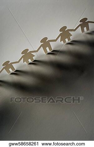 High angle view of paper chain dolls View Large Photo Image Stock Image - High angle view of paper chain dolls. Fotosearch
