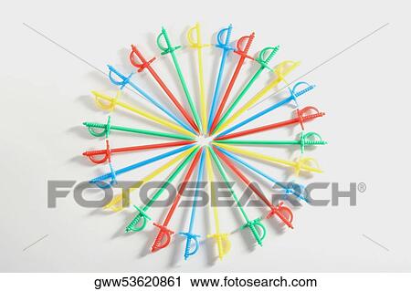 Stock Image - High angle view of plastic toothpicks arranged in a circular pattern. Fotosearch