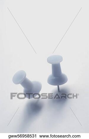 High angle view of two thumbtacks View Large Photo Image Stock Image - High angle view of two thumbtacks. Fotosearch