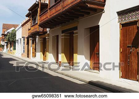 Houses along a street View Large Photo Image Stock Image - Houses along a street. Fotosearch