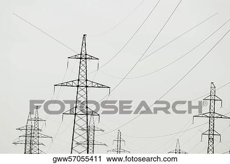 Low angle view of electricity pylons View Large Photo Image Stock Image - Low angle view of electricity pylons. Fotosearch