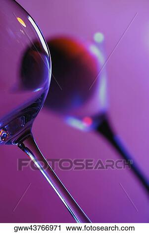 Low angle view of martini glasses View Large Photo Image Stock Image - Low angle view of martini glasses. Fotosearch