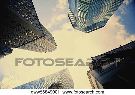 Stock Image - Low angle view of office buildings, Chrysler Building, Manhattan, New York City, New York State, USA. Fotosearch