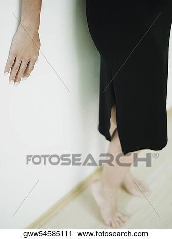 Low section view of a woman View Large Photo Image Stock Image - Low section view of a woman. Fotosearch