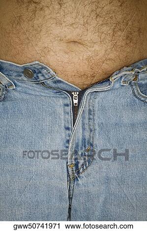 Mid section view of a man View Large Photo Image Stock Image - Mid section view of a man. Fotosearch