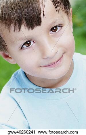 Portrait of a boy grinning View Large Photo Image Stock Image - Portrait of a boy grinning. Fotosearch