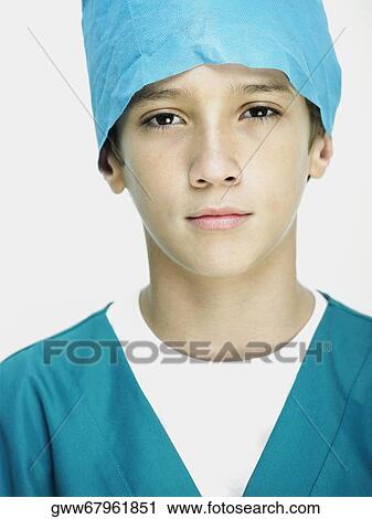 Portrait of a boy wearing surgical scrubs View Large Photo Image Stock Image - Portrait of a boy wearing surgical scrubs. Fotosearch