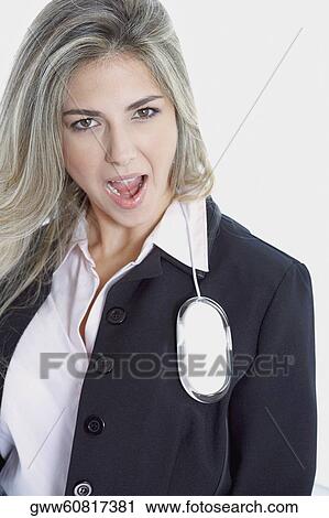 Stock Image - Portrait of a businesswoman looking surprised. Fotosearch