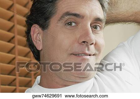 Stock Image - Portrait of a mature man smiling. Fotosearch