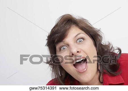 Stock Image - Portrait of a mature woman shouting. Fotosearch