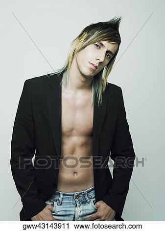 Portrait of a young man posing View Large Photo Image Stock Image - Portrait of a young man posing. Fotosearch