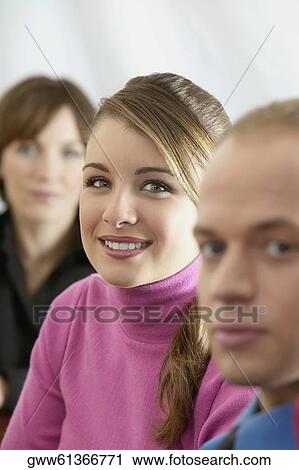 Portrait of a young man with two young women View Large Photo Image Stock Image - Portrait of a young man with two young women. Fotosearch