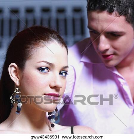 Portrait of a young woman and a teenage boy View Large Photo Image Stock Image - Portrait of a young woman and a teenage boy. Fotosearch