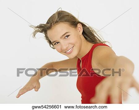 Portrait of a young woman smiling View Large Photo Image Stock Image - Portrait of a young woman smiling. Fotosearch