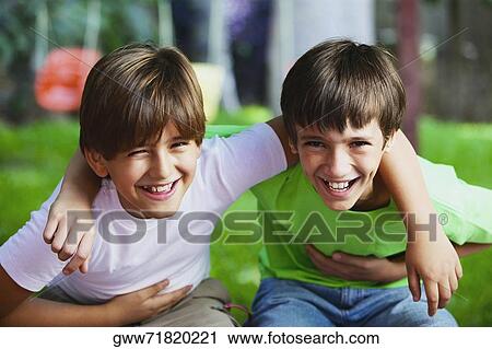 Portrait of two boys smiling View Large Photo Image Stock Image - Portrait of two boys smiling. Fotosearch