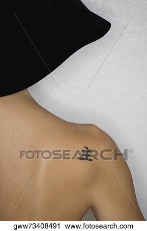 Rear view of a woman View Large Photo Image Stock Image - Rear view of a woman. Fotosearch