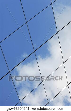 Reflection of sky and clouds on a building View Large Photo Image Stock Image - Reflection of sky and clouds on a building. Fotosearch