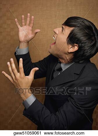Side profile of a businessman shouting View Large Photo Image Stock Image - Side profile of a businessman shouting. Fotosearch