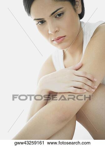 Side profile of a young woman thinking View Large Photo Image Stock Image - Side profile of a young woman thinking. Fotosearch