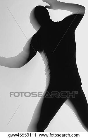 Silhouette of a person dancing View Large Photo Image Stock Image - Silhouette of a person dancing. Fotosearch