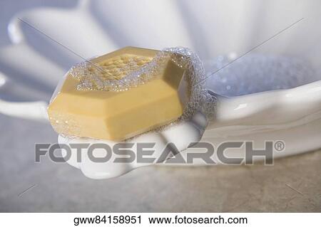 Bar of soap on a soap dish View Large Photo Image Stock Image - Bar of soap on a soap dish. Fotosearch