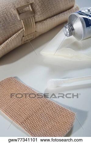 Close-up of a bandage and ointments View Large Photo Image Stock Image - Close-up of a bandage and ointments. Fotosearch