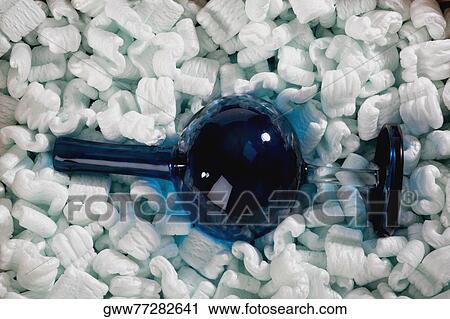Close-up of a broken vase with packing peanuts View Large Photo Image Stock Image - Close-up of a broken vase with packing peanuts. Fotosearch