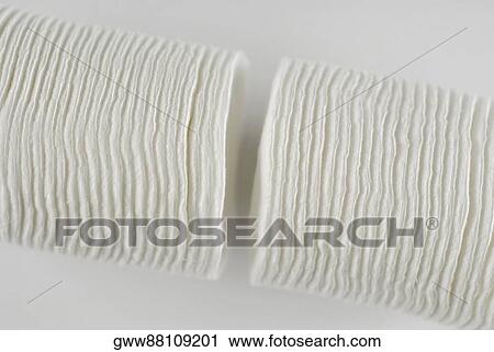 Stock Image - Close-up of a bundle of cotton pads. Fotosearch