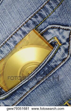 Close-up of a CD in a person's jeans pocket View Large Photo Image Stock Image - Close-up of a CD in a person's jeans pocket. Fotosearch