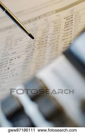 Close-up of a digitized pen on a stock market data sheet View Large Photo Image Stock Image - Close-up of a digitized pen on a stock market data sheet. Fotosearch