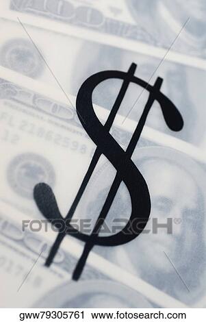 Close-up of a dollar sign superimposed on American paper currency View Large Photo Image Stock Image - Close-up of a dollar sign superimposed on American paper currency. Fotosearch