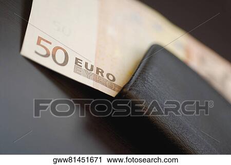Close-up of a fifty Euro dollar in a wallet View Large Photo Image Stock Image - Close-up of a fifty Euro dollar in a wallet. Fotosearch