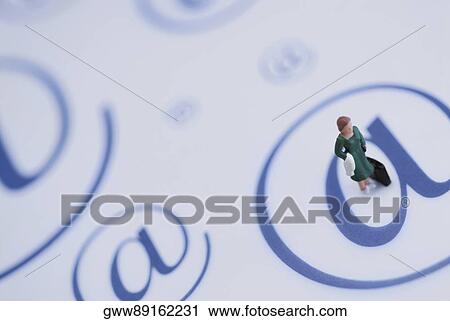 Close-up of a figurine on At symbols View Large Photo Image Stock Image - Close-up of a figurine on At symbols. Fotosearch