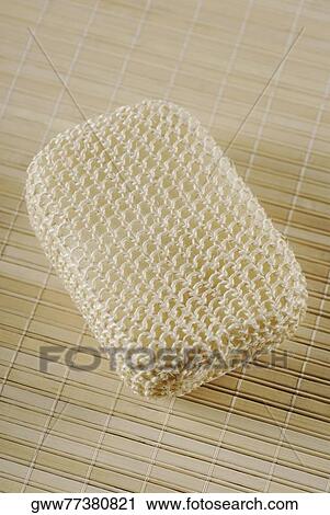 Close-up of a loofah on a mat View Large Photo Image Stock Image - Close-up of a loofah on a mat. Fotosearch