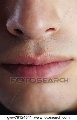 Close-up of a man's mouth and nose View Large Photo Image Stock Image - Close-up of a man's mouth and nose. Fotosearch