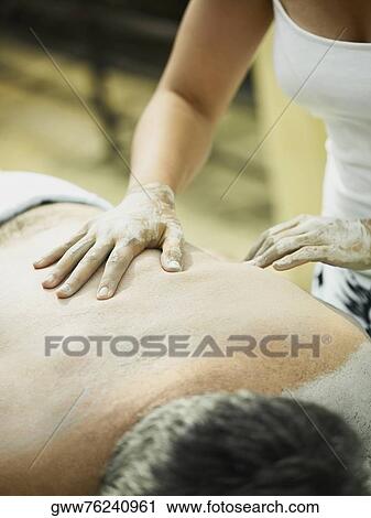 Close-up of a mature man getting spa treatment View Large Photo Image Stock Image - Close-up of a mature man getting spa treatment. Fotosearch
