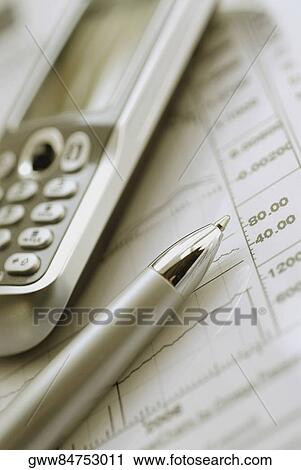 Close-up of a mobile phone and a pen on a sheet of paper View Large Photo Image Stock Image - Close-up of a mobile phone and a pen on a sheet of paper. Fotosearch