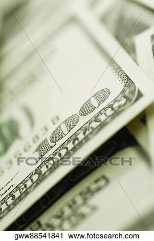 Stock Image - Close-up of a one hundred dollar bill. Fotosearch