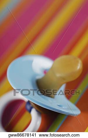 Close-up of a pacifier View Large Photo Image Stock Image - Close-up of a pacifier. Fotosearch