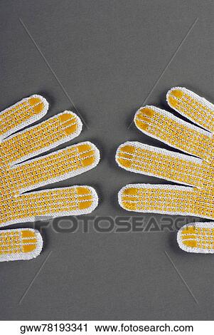 Close-up of a pair of gloves View Large Photo Image Stock Image - Close-up of a pair of gloves. Fotosearch