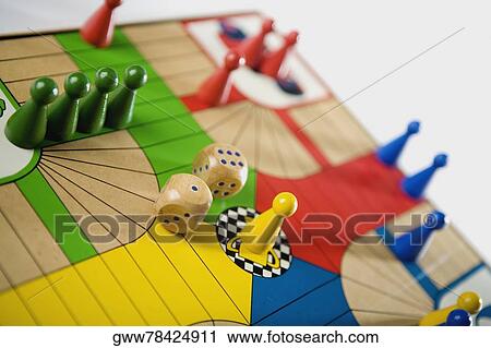 Stock Image - Close-up of a Parcheesi board. Fotosearch