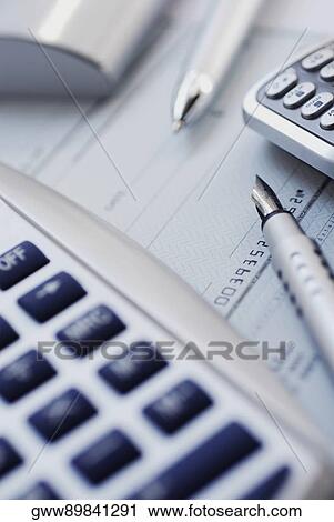 Close-up of a pen and computer mouse with a calculator View Large Photo Image Stock Image - Close-up of a pen and computer mouse with a calculator. Fotosearch