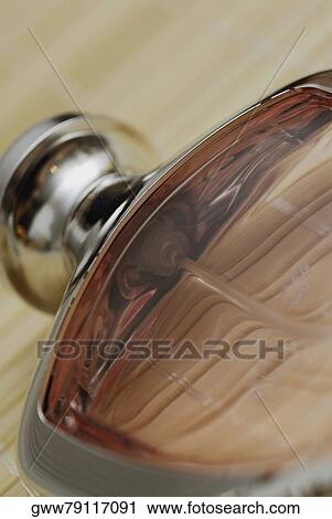 Stock Image - Close-up of a perfume bottle. Fotosearch