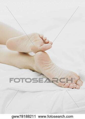 Stock Image - Close-up of a person's feet. Fotosearch