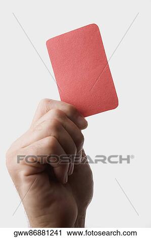 Close-up of a person's hand holding a red card View Large Photo Image Stock Image - Close-up of a person's hand holding a red card. Fotosearch