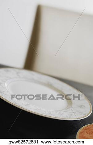 Stock Image - Close-up of a plate on the table. Fotosearch