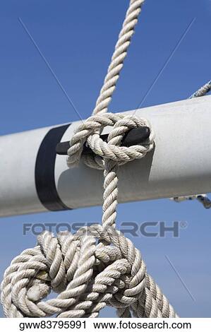 Close-up of a rope tied to a cleat View Large Photo Image Stock Image - Close-up of a rope tied to a cleat. Fotosearch