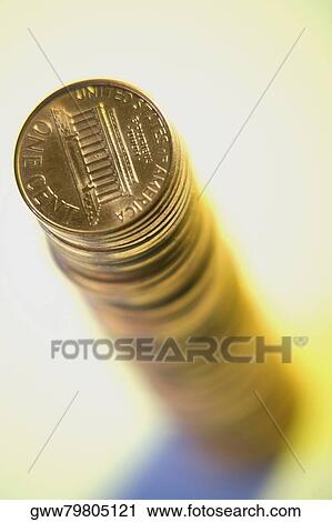 Stock Image - Close-up of a stack of American coins. Fotosearch