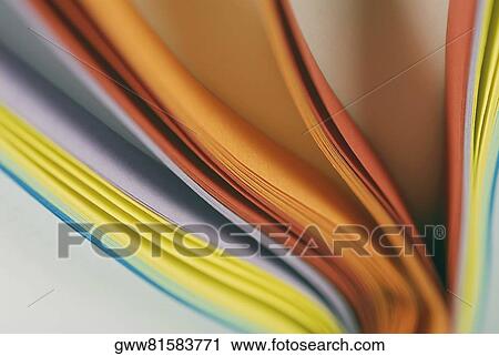 Close-up of a stack of multi-colored paper View Large Photo Image Stock Image - Close-up of a stack of multi-colored paper. Fotosearch