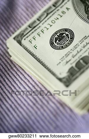Close-up of a stack of one hundred dollar bills View Large Photo Image Stock Image - Close-up of a stack of one hundred dollar bills. Fotosearch